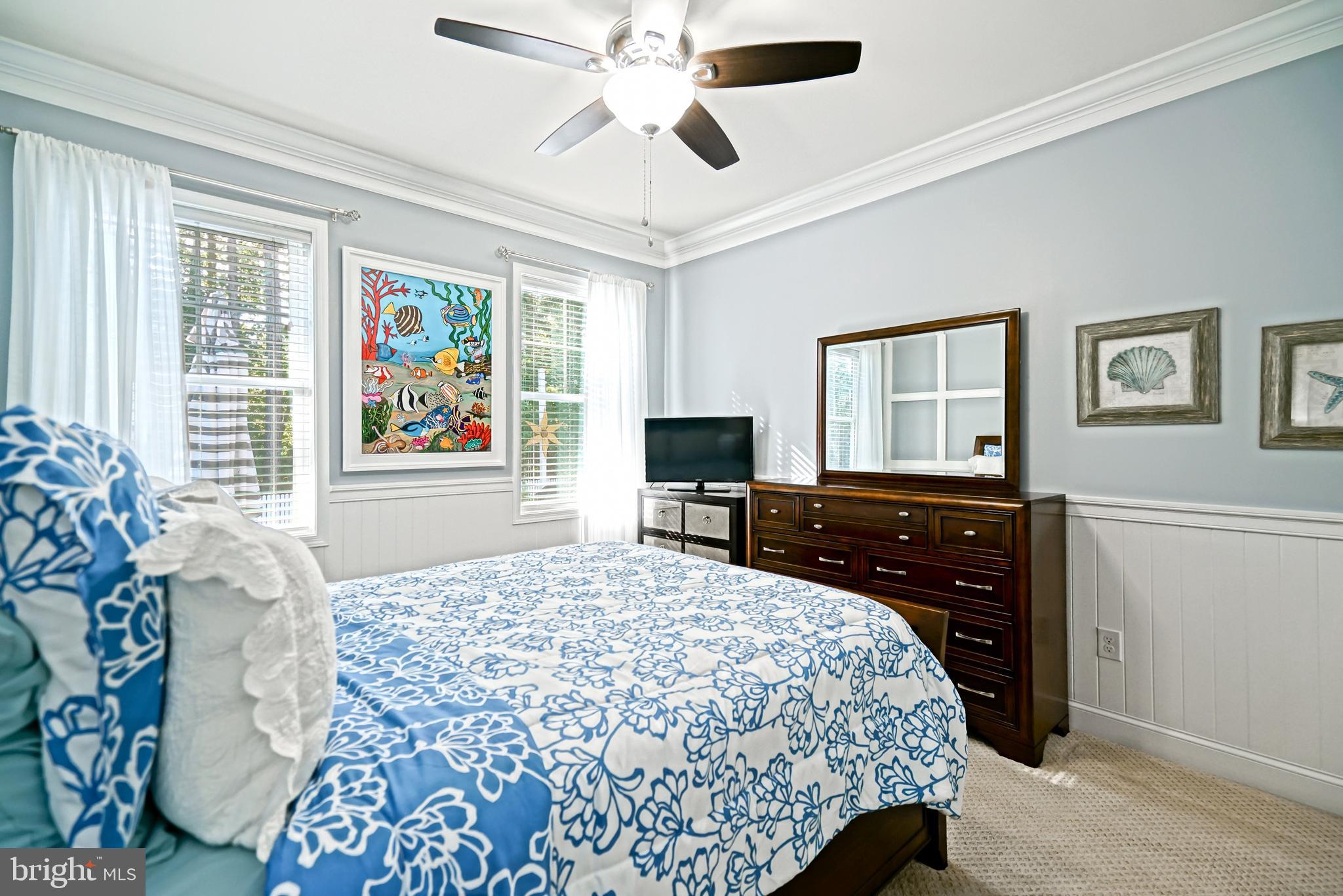 35236 Acadia Lane Lewes, DE 19958 - Photo 46 of 88 a bedroom with a bed dresser and a window