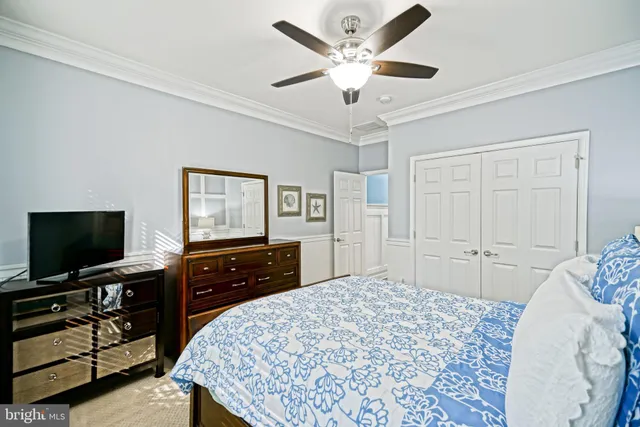 a view of a room with lots of chairs and wooden floor