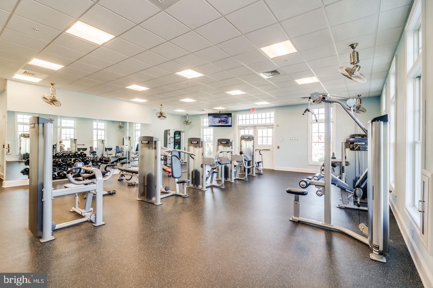 35236 Acadia Lane Lewes, DE 19958 - Photo 79 of 88 a view of a room with lots of chairs and wooden floor