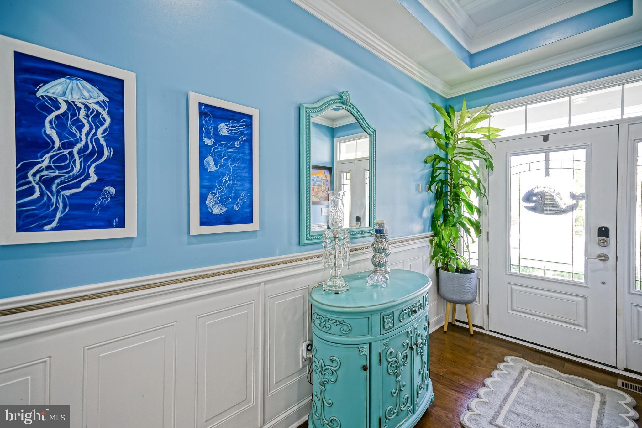 35236 Acadia Lane Lewes, DE 19958 - Photo 8 of 88 a living room with furniture and a potted plant