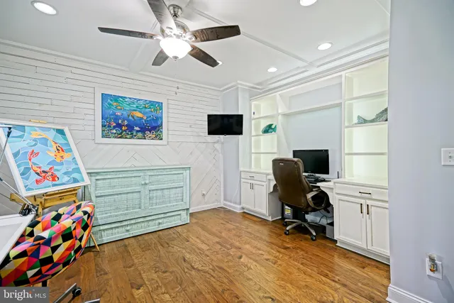 a kitchen with stainless steel appliances kitchen island granite countertop a refrigerator a stove a sink dishwasher with a dining table and chairs