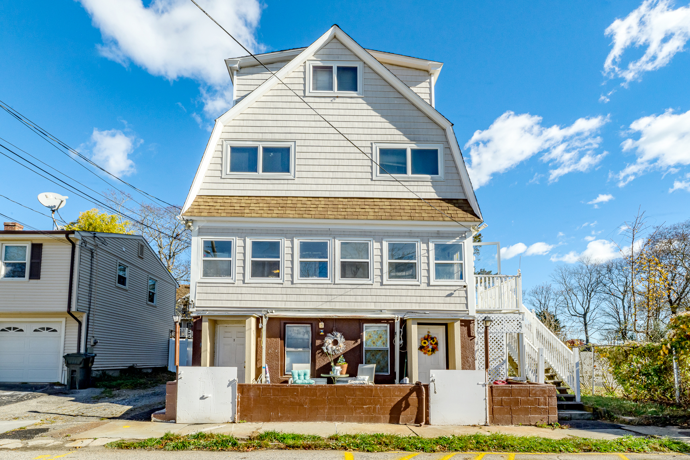 41 Stuart Avenue New London, CT 06320 - Photo 5 of 13 a front view of a house with a yard