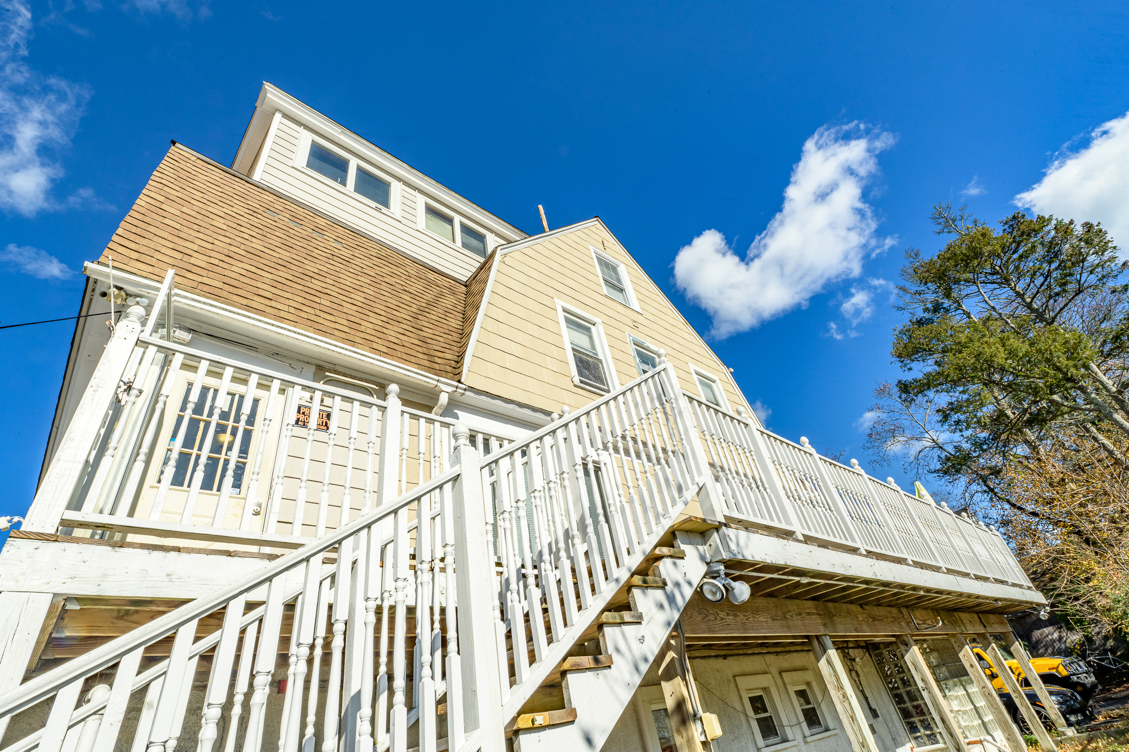41 Stuart Avenue New London, CT 06320 - Photo 7 of 13 a view of a house with a balcony