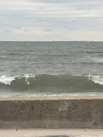 a view of ocean with beach