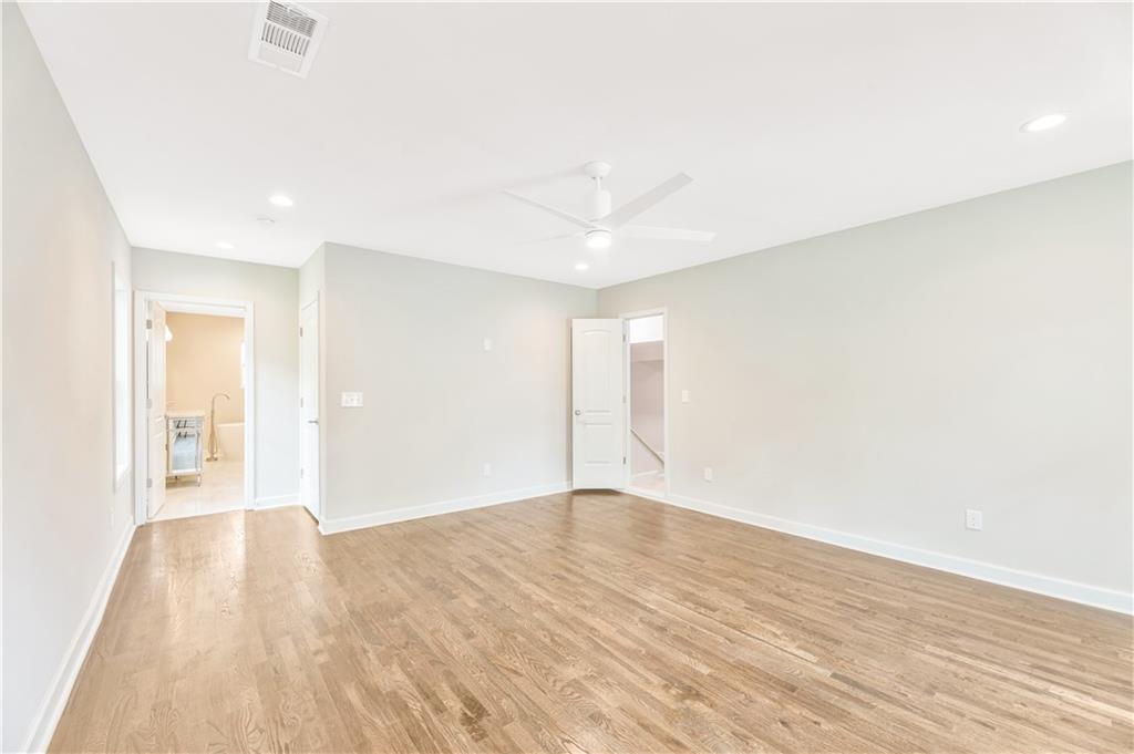 1776 Temple Avenue Atlanta, GA 30337 - Photo 12 of 18 a view of an empty room with wooden floor