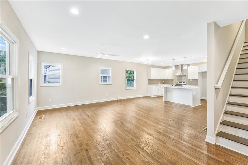 1776 Temple Avenue Atlanta, GA 30337 - Photo 2 of 18 a view of a kitchen with wooden floor and a kitchen