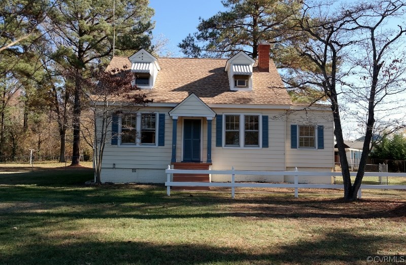 6529 Hopkins Road North Chesterfield, VA 23234 - Photo 1 of 24 a front view of a house with a garden