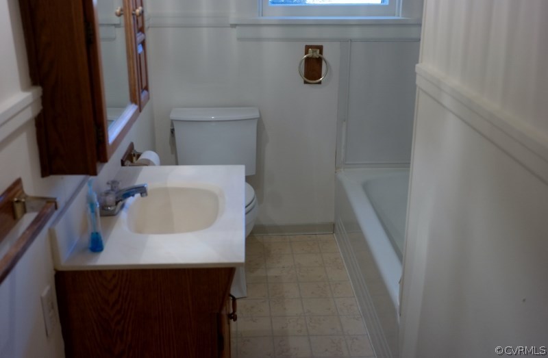 6529 Hopkins Road North Chesterfield, VA 23234 - Photo 12 of 24 a bathroom with a sink and a mirror