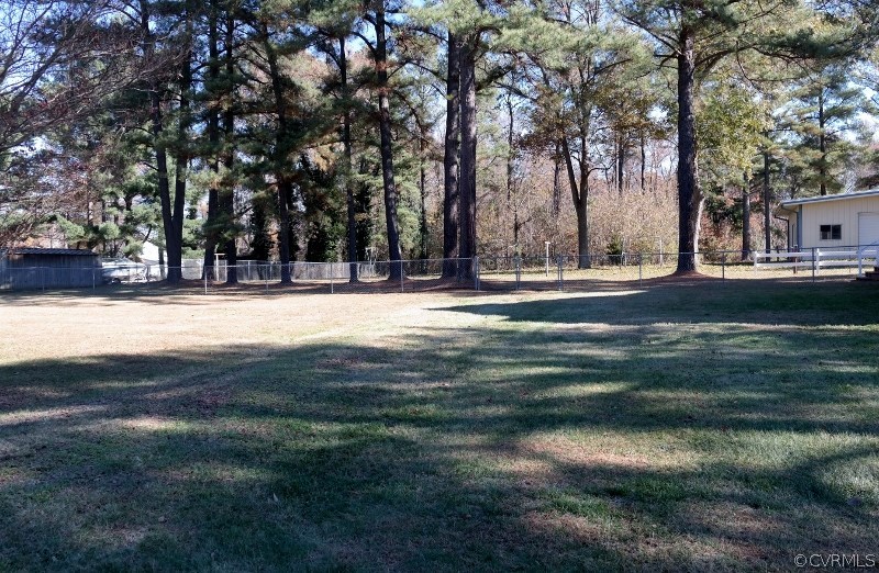 6529 Hopkins Road North Chesterfield, VA 23234 - Photo 24 of 24 a view of road with trees