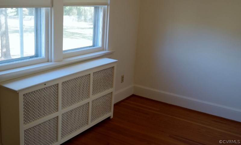 6529 Hopkins Road North Chesterfield, VA 23234 - Photo 6 of 24 a view of empty room with wooden floor and fan