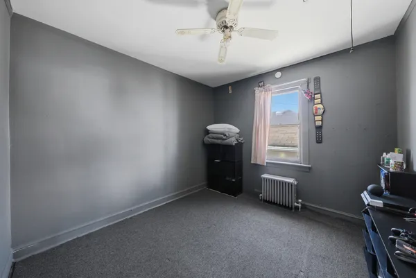 a room with furniture and window