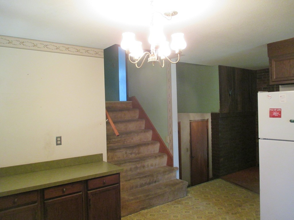 2 Barton Street Granby, MA 01033 - Photo 11 of 24 a view of entryway and hall with wooden floor
