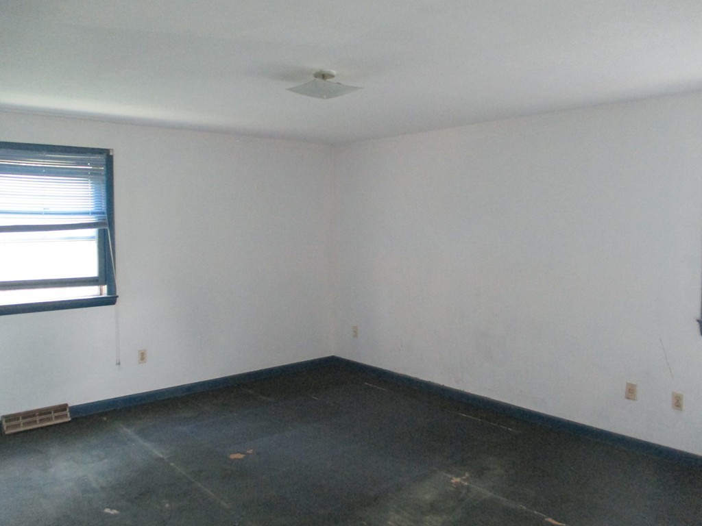 2 Barton Street Granby, MA 01033 - Photo 12 of 24 a view of a room that has a window in it