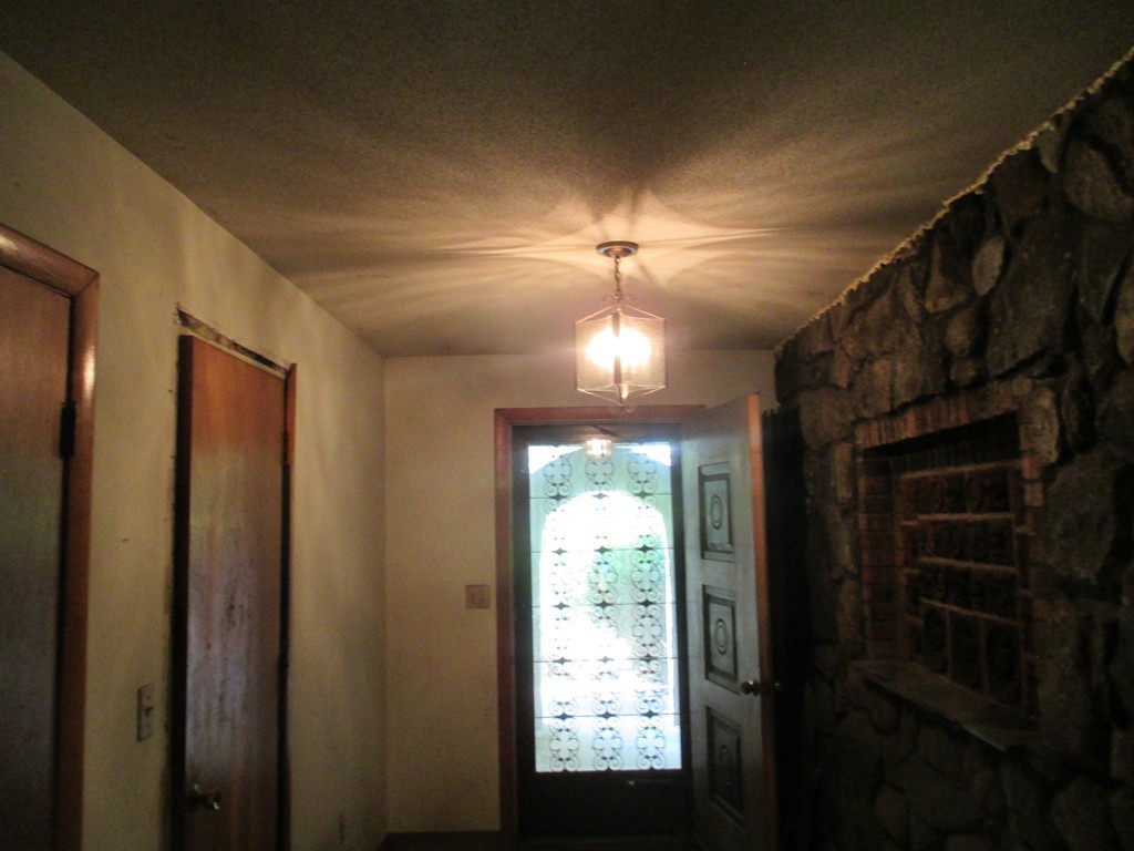 2 Barton Street Granby, MA 01033 - Photo 5 of 24 a view of a livingroom with a ceiling fan and window