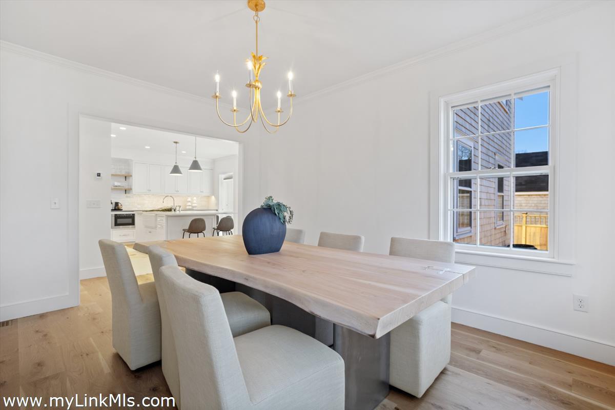 22 Vestal Street Nantucket, MA 02554 - Photo 14 of 43 a view of a dining room with furniture and window