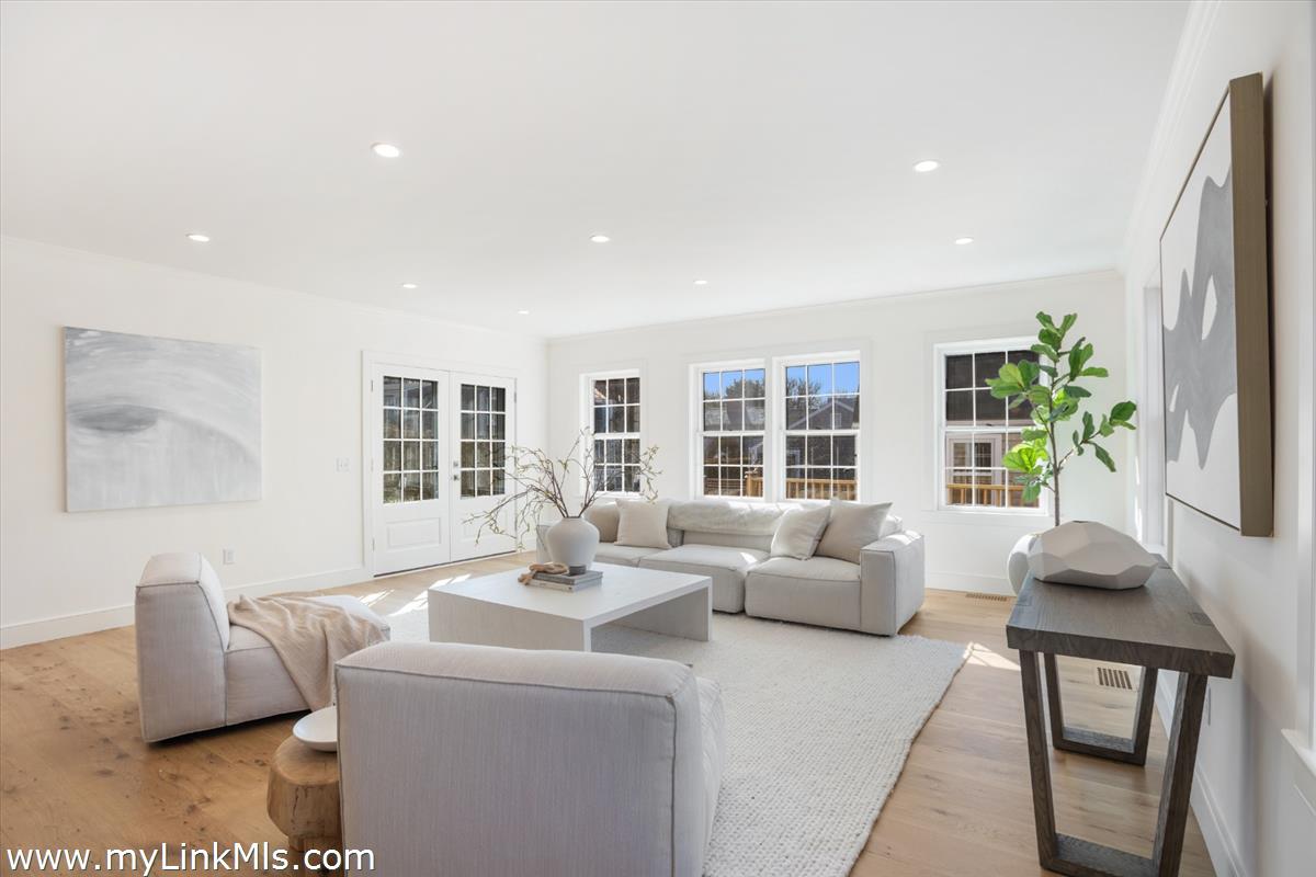 22 Vestal Street Nantucket, MA 02554 - Photo 19 of 43 a living room with furniture and a large window