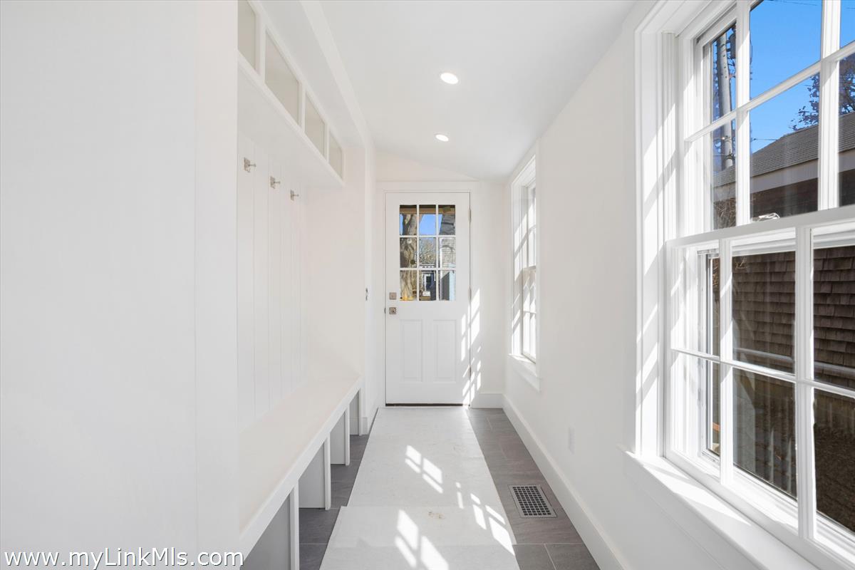 22 Vestal Street Nantucket, MA 02554 - Photo 22 of 43 a view of a hallway with windows