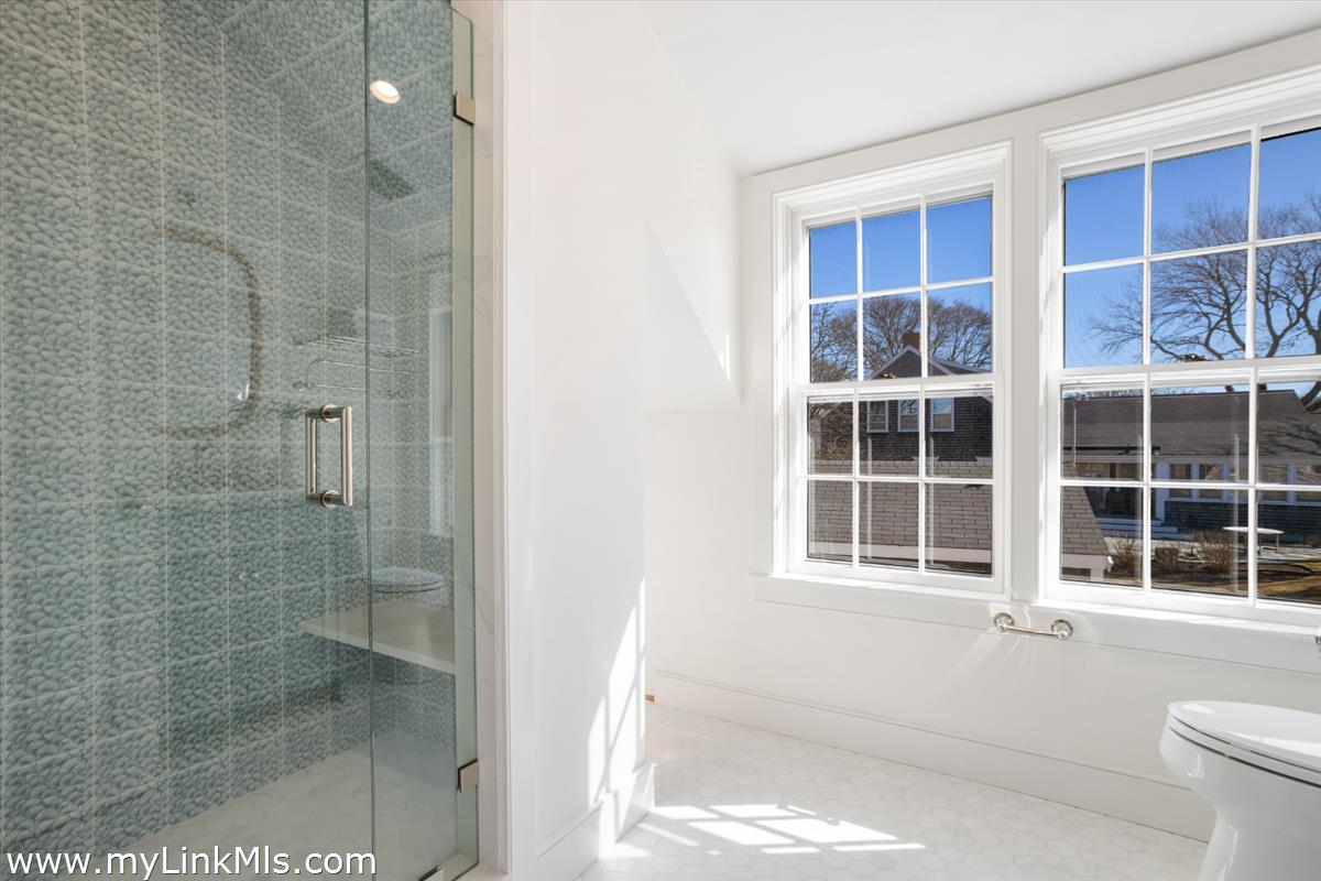 22 Vestal Street Nantucket, MA 02554 - Photo 28 of 43 a bathroom with a window and a shower
