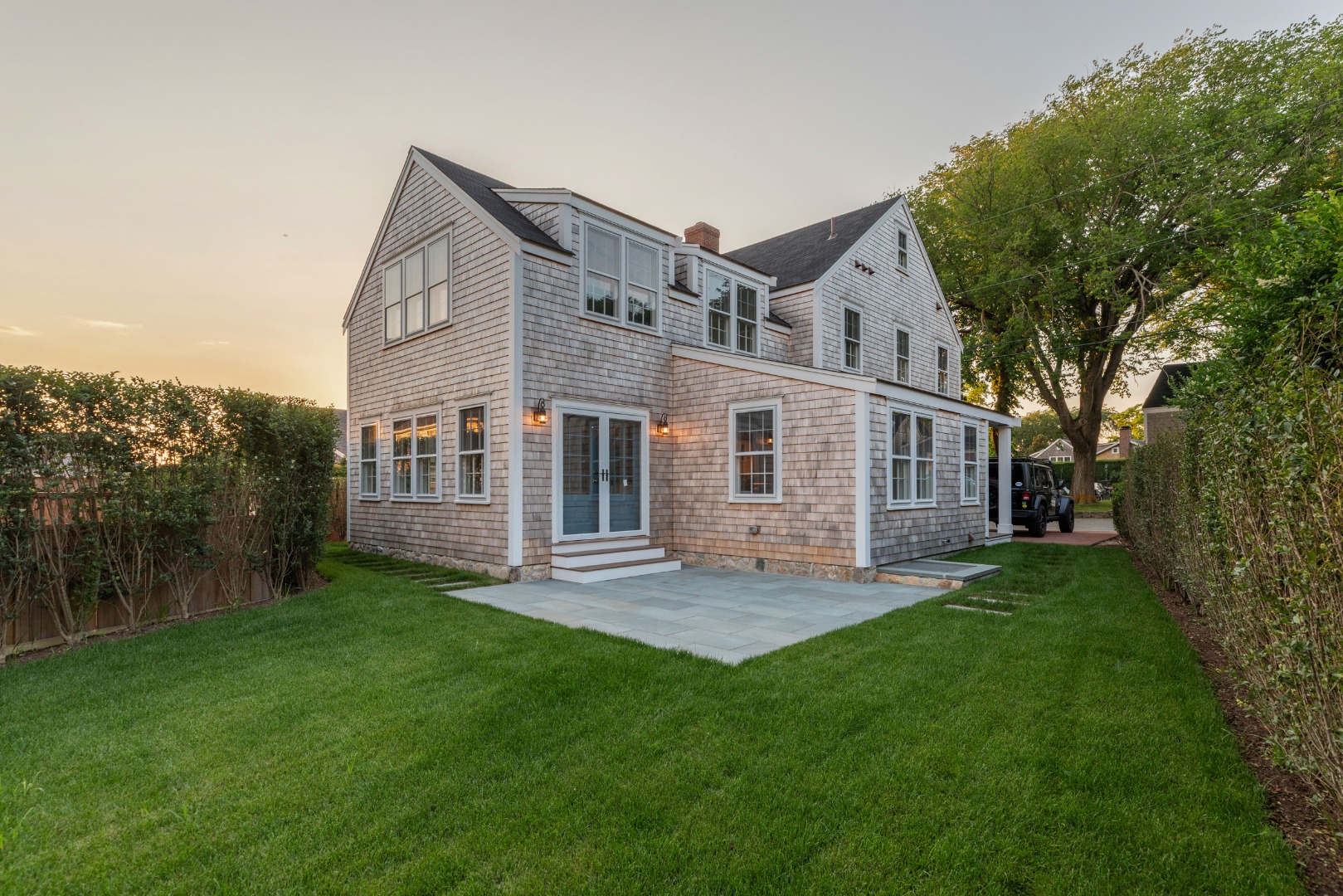 22 Vestal Street Nantucket, MA 02554 - Photo 3 of 43 a view of a house with a yard and sitting area