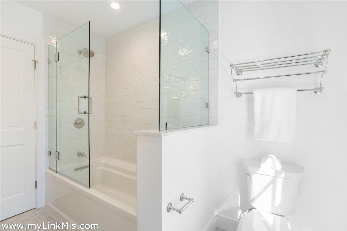 22 Vestal Street Nantucket, MA 02554 - Photo 36 of 43 a bathroom with a shower and a tub