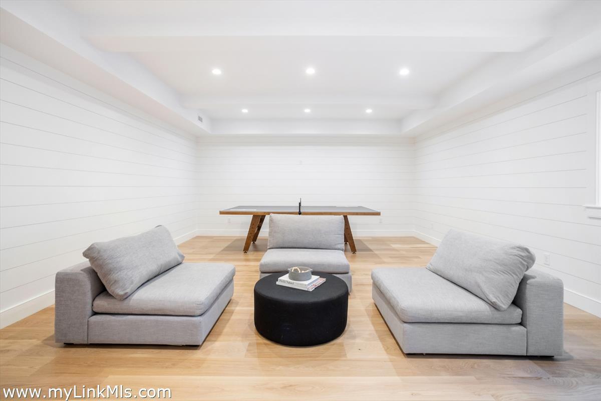 22 Vestal Street Nantucket, MA 02554 - Photo 39 of 43 a living room with furniture and a couch