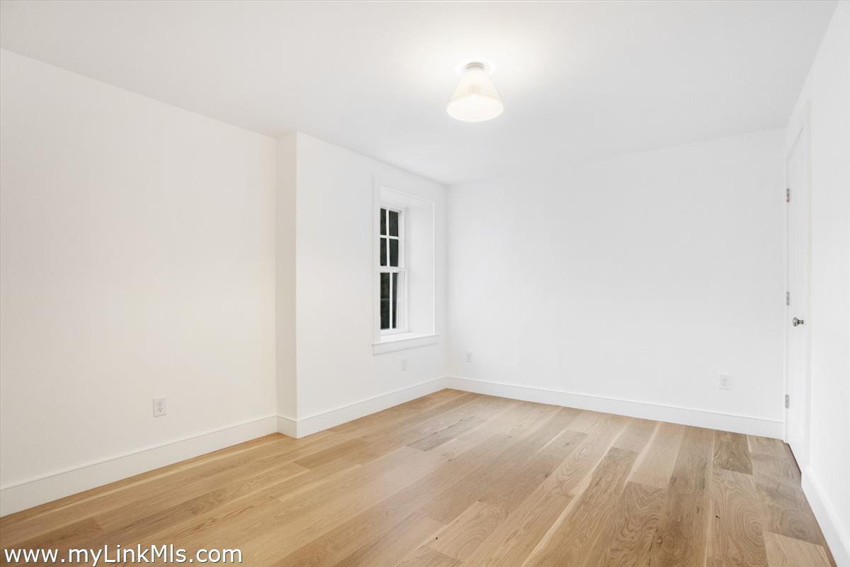 22 Vestal Street Nantucket, MA 02554 - Photo 42 of 43 a view of empty room with wooden floor