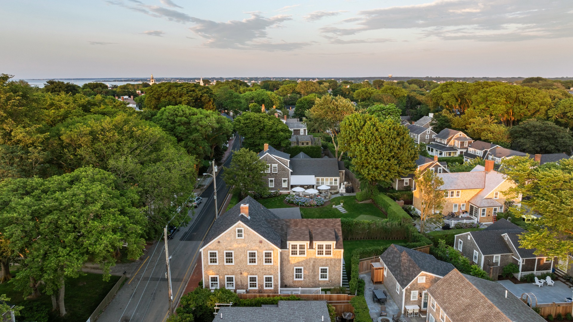 22 Vestal Street Nantucket, MA 02554 - Photo 5 of 43 an aerial view of a house with a yard and lake view