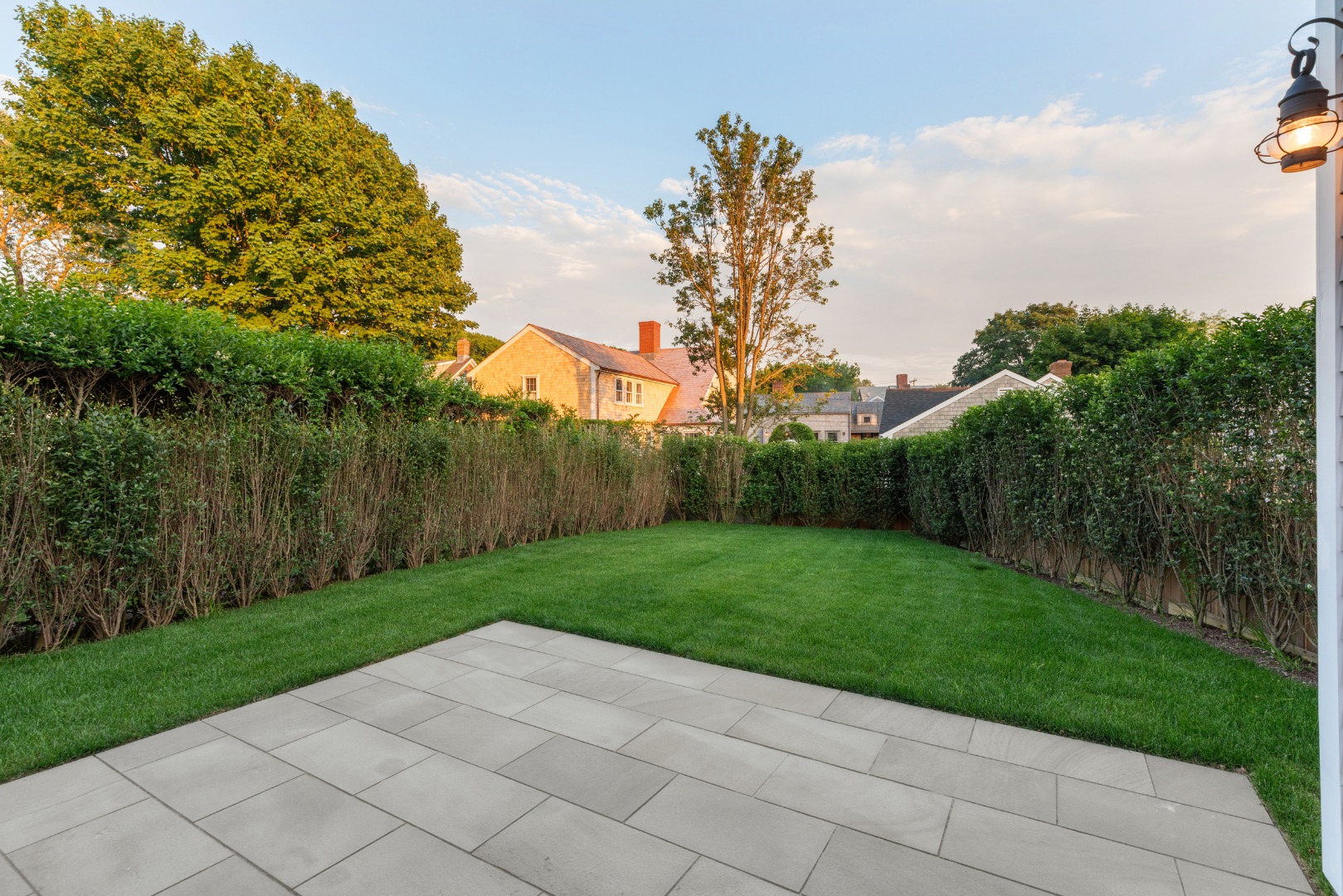 22 Vestal Street Nantucket, MA 02554 - Photo 7 of 43 a view of a park with plants and a bench