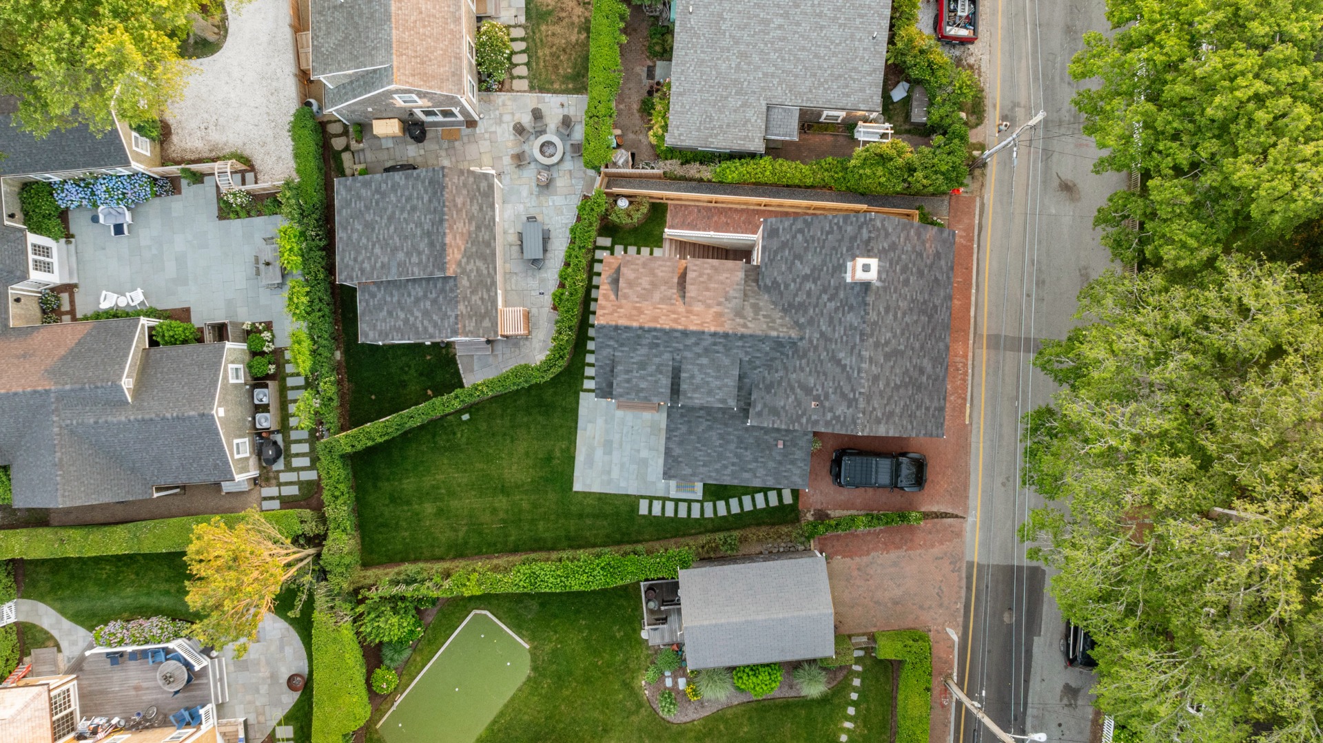 22 Vestal Street Nantucket, MA 02554 - Photo 8 of 43 an aerial view of a house with a garden and plants