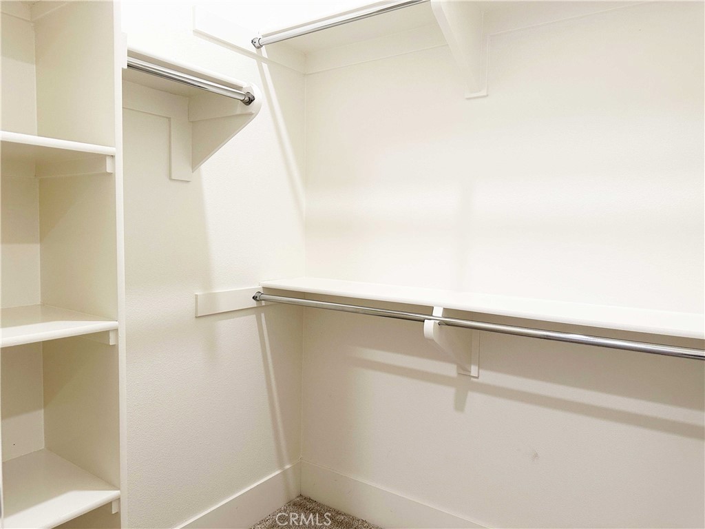 58 Ray Irvine, CA 92618 - Photo 15 of 35 a view of a room with racks on the wall