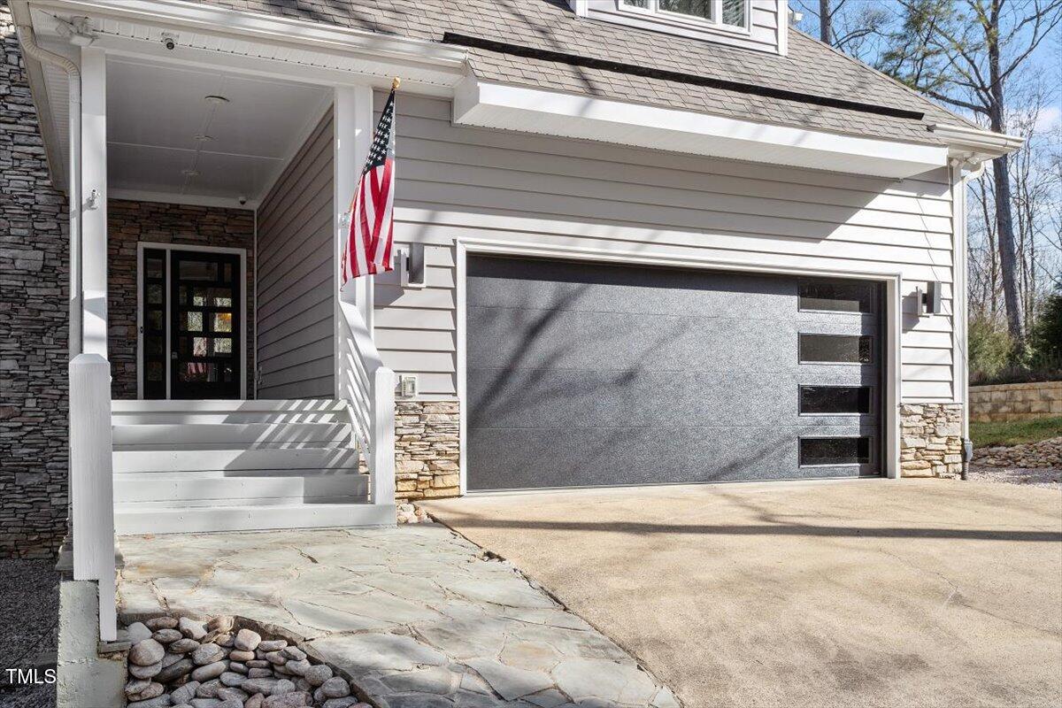5920 Orchid Valley Road Raleigh, NC 27613 - Photo 5 of 54 New Garage door, front door and siding