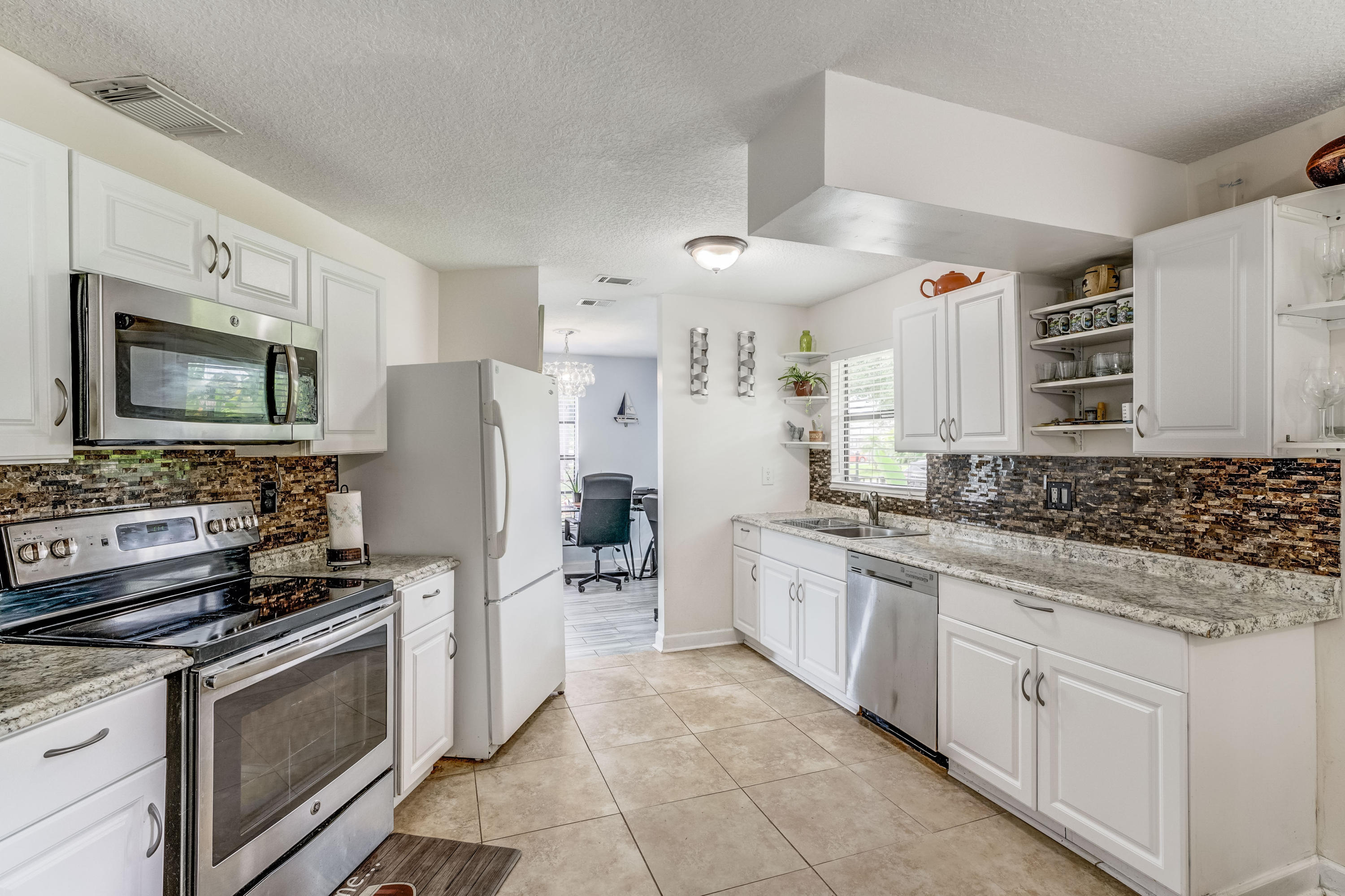 6120 Wolfe Street Jupiter, FL 33458 - Photo 4 of 55 Upgraded Kitchen