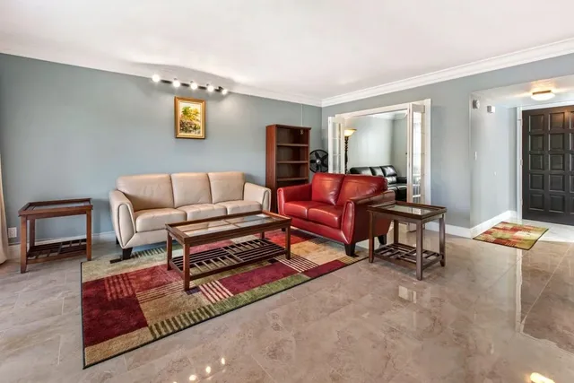 a living room with furniture and a couch