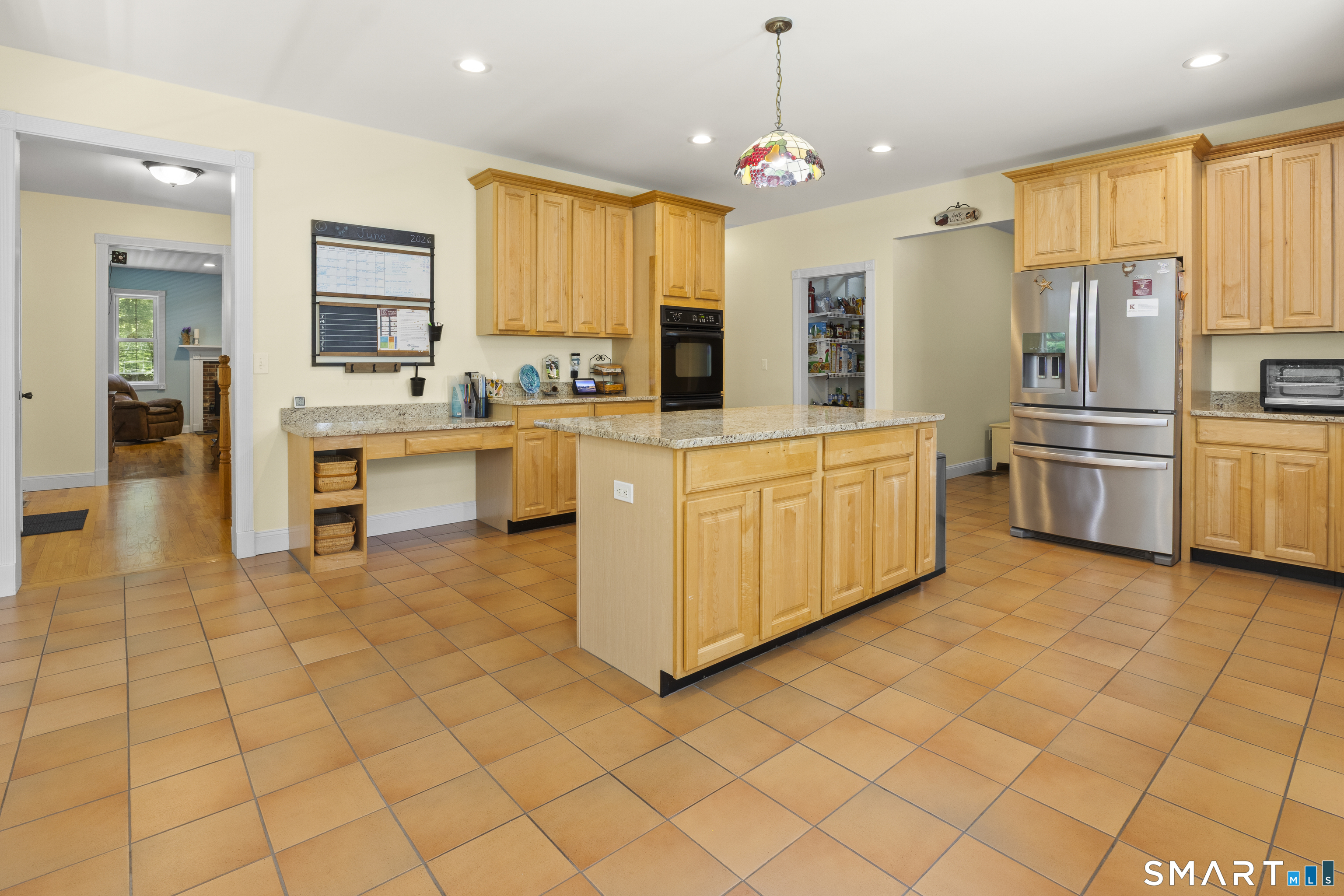 175 Cranberry Bog Road Killingly, CT 06239 - Photo 9 of 40 a large kitchen with stainless steel appliances granite countertop a refrigerator and a stove top oven