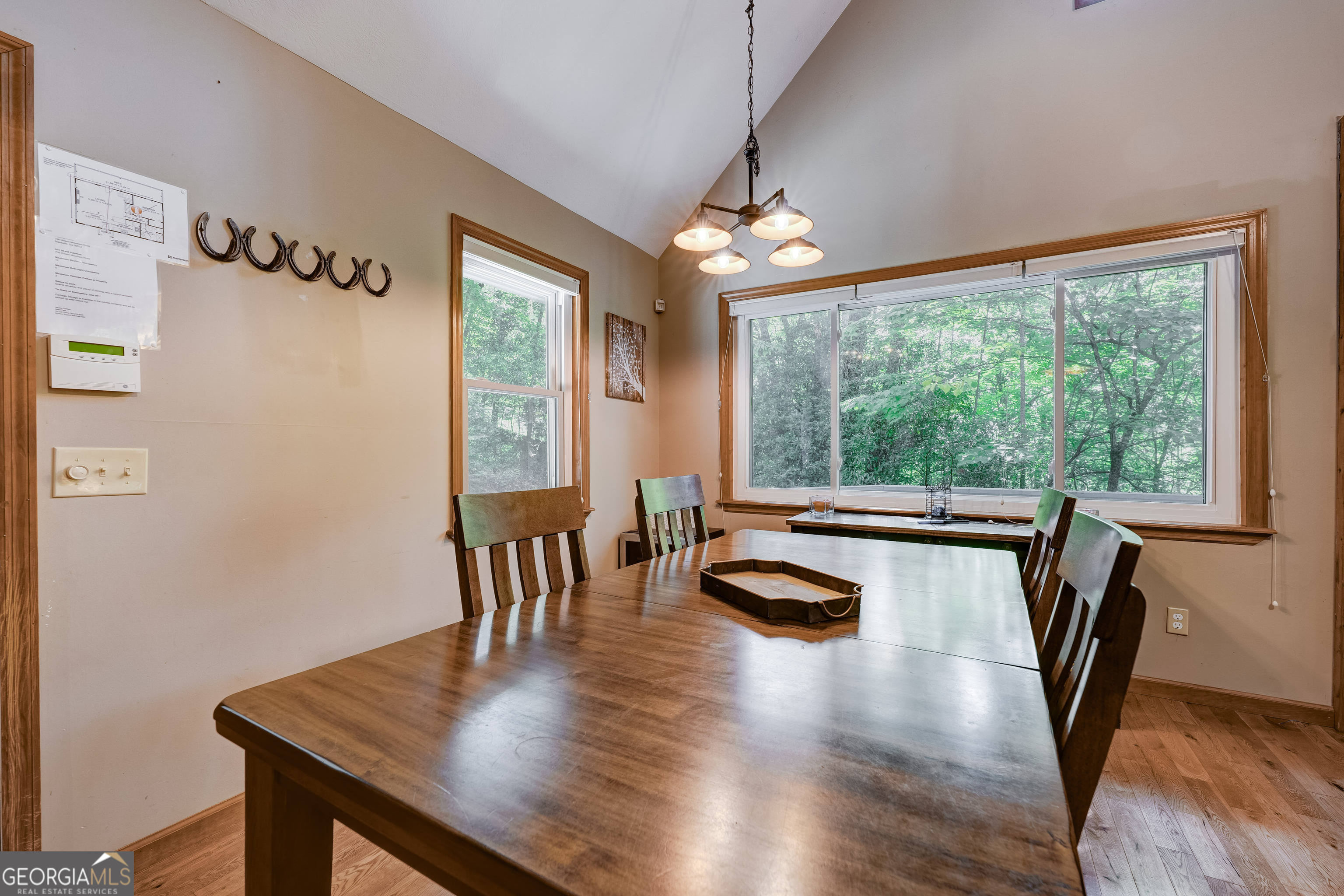 708 Wilson Mountain Road Blairsville, GA 30512 - Photo 12 of 48 a dining room with furniture window wooden floor