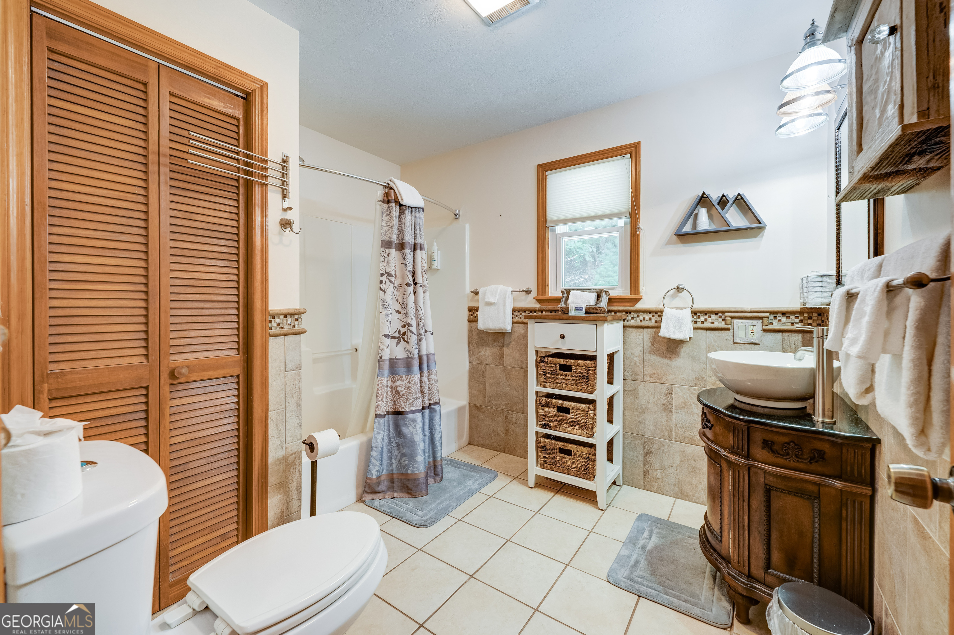 708 Wilson Mountain Road Blairsville, GA 30512 - Photo 20 of 48 a room with stainless steel appliances furniture and a large window