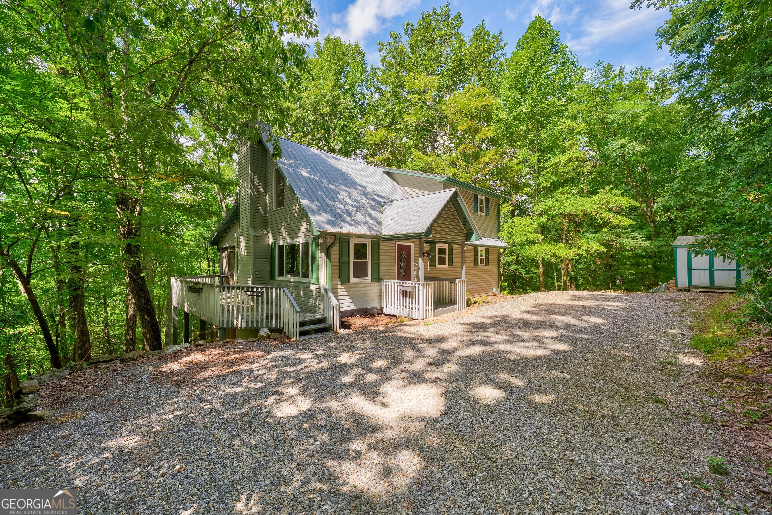 708 Wilson Mountain Road Blairsville, GA 30512 - Photo 2 of 48 a view of a house with a yard