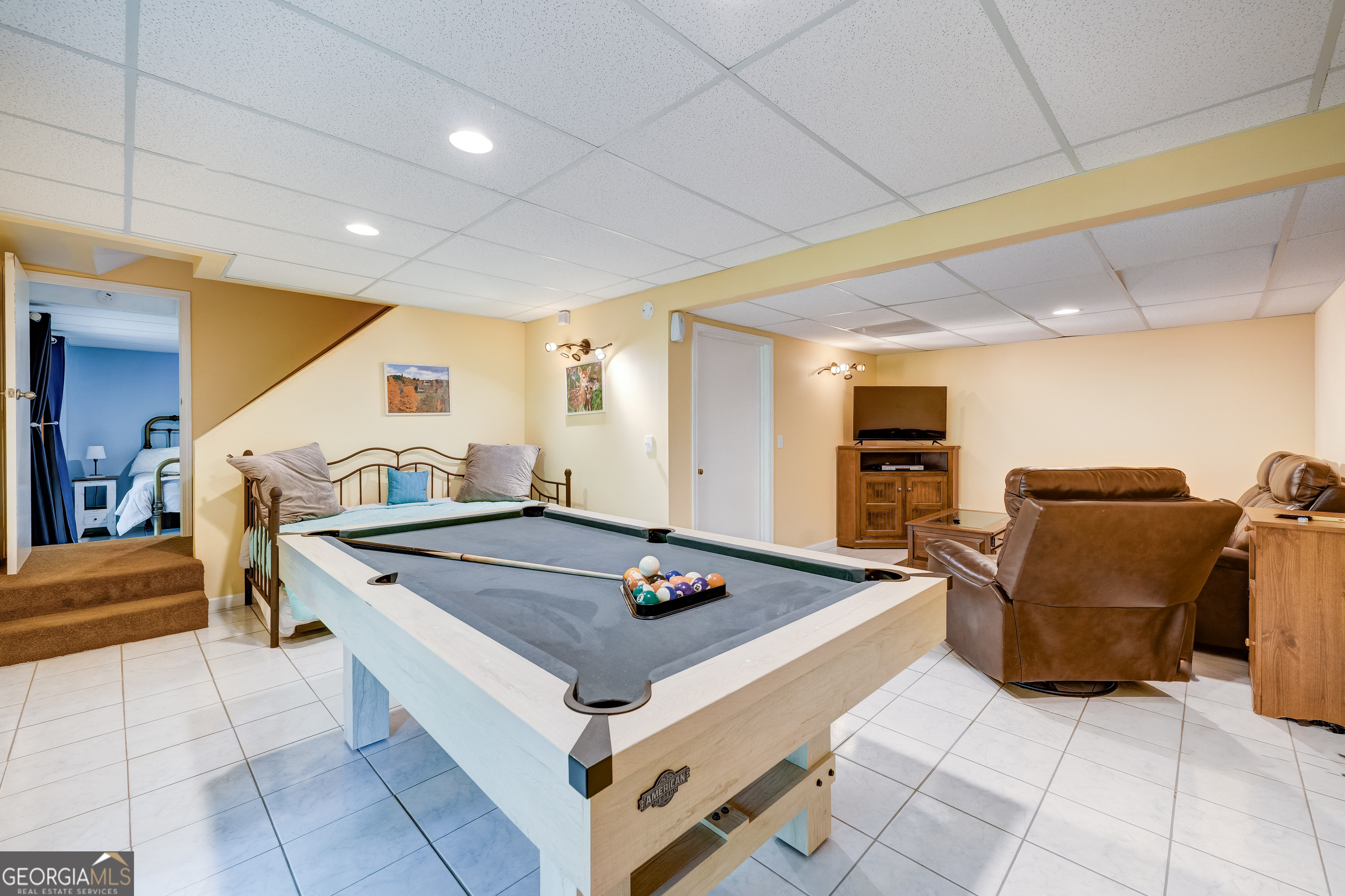 708 Wilson Mountain Road Blairsville, GA 30512 - Photo 31 of 48 a kitchen with stainless steel appliances kitchen island granite countertop a sink and cabinets