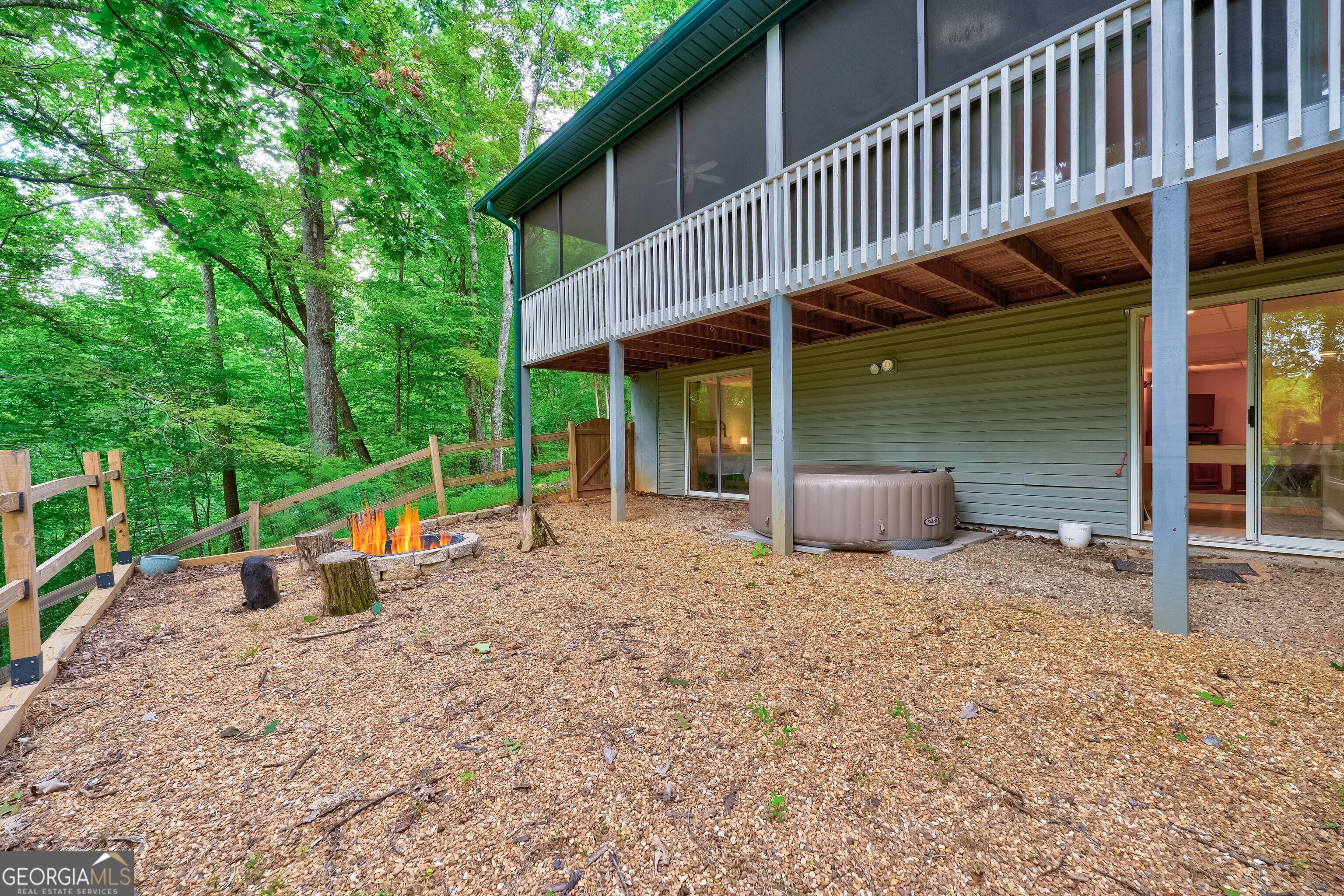 708 Wilson Mountain Road Blairsville, GA 30512 - Photo 38 of 48 a view of a house with backyard and sitting area