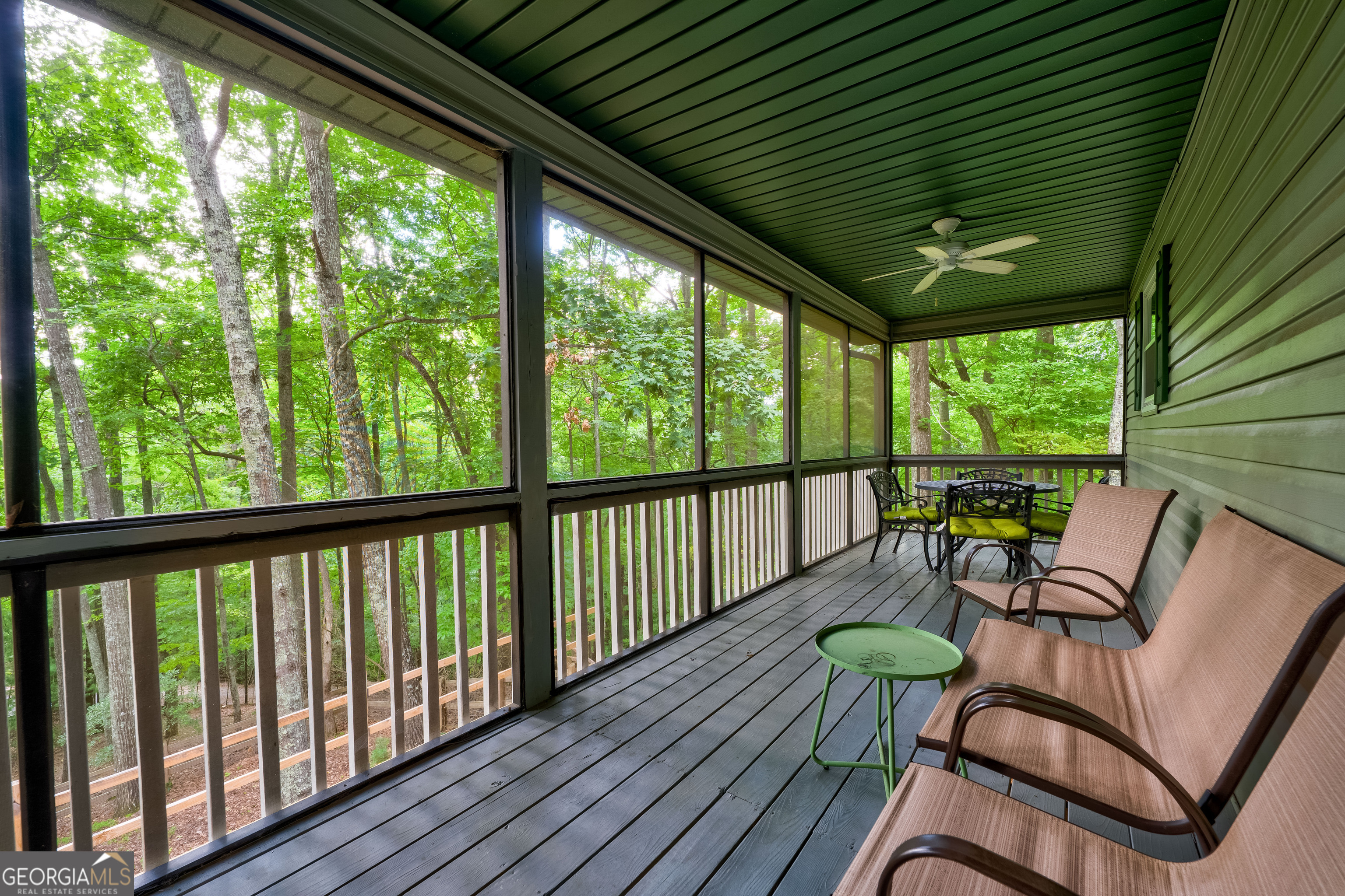 708 Wilson Mountain Road Blairsville, GA 30512 - Photo 40 of 48 a view of a chairs in wooden deck