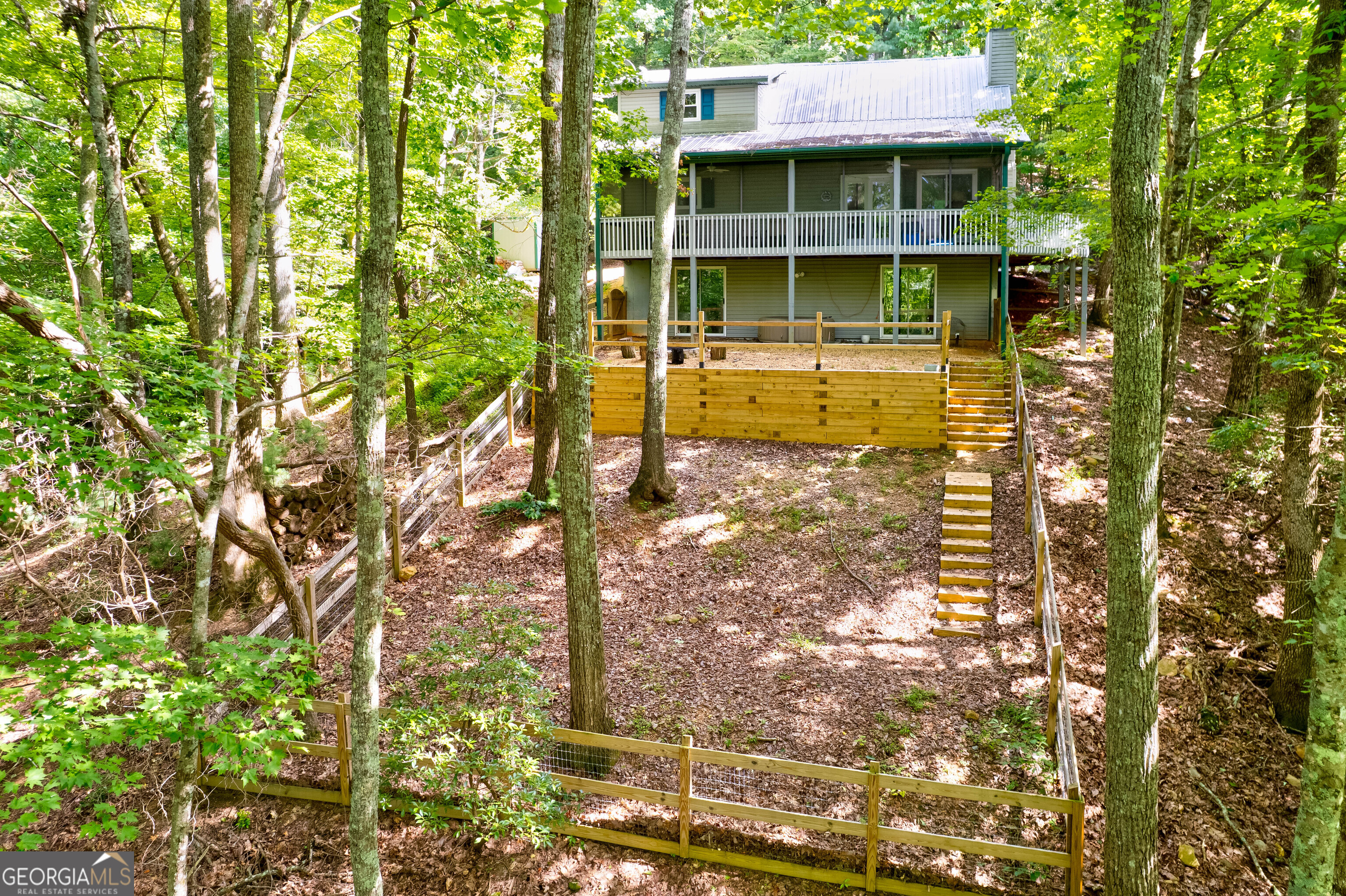 708 Wilson Mountain Road Blairsville, GA 30512 - Photo 42 of 48 a front view of a house with a yard