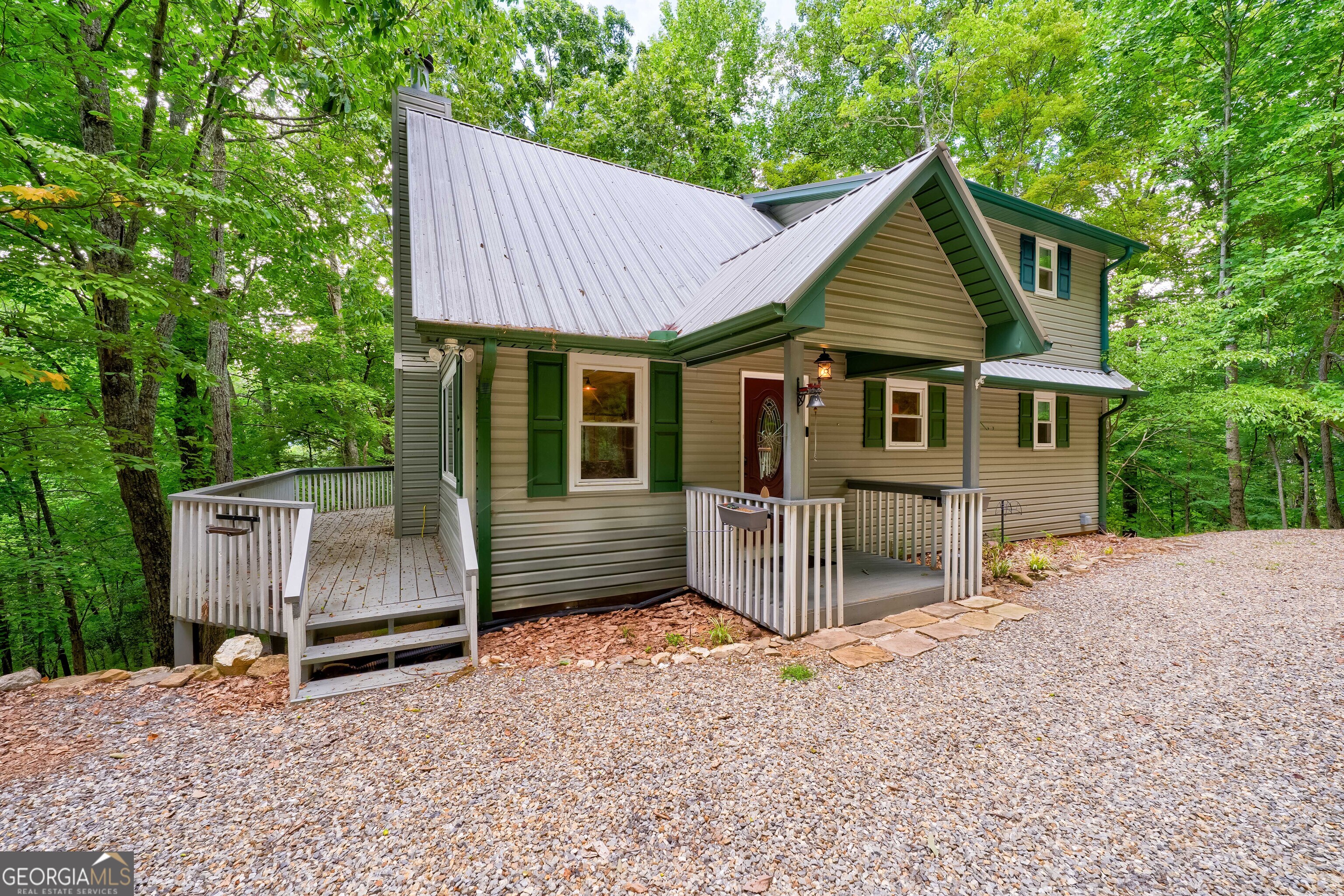 708 Wilson Mountain Road Blairsville, GA 30512 - Photo 46 of 48 a view of a house with a yard and wooden fence