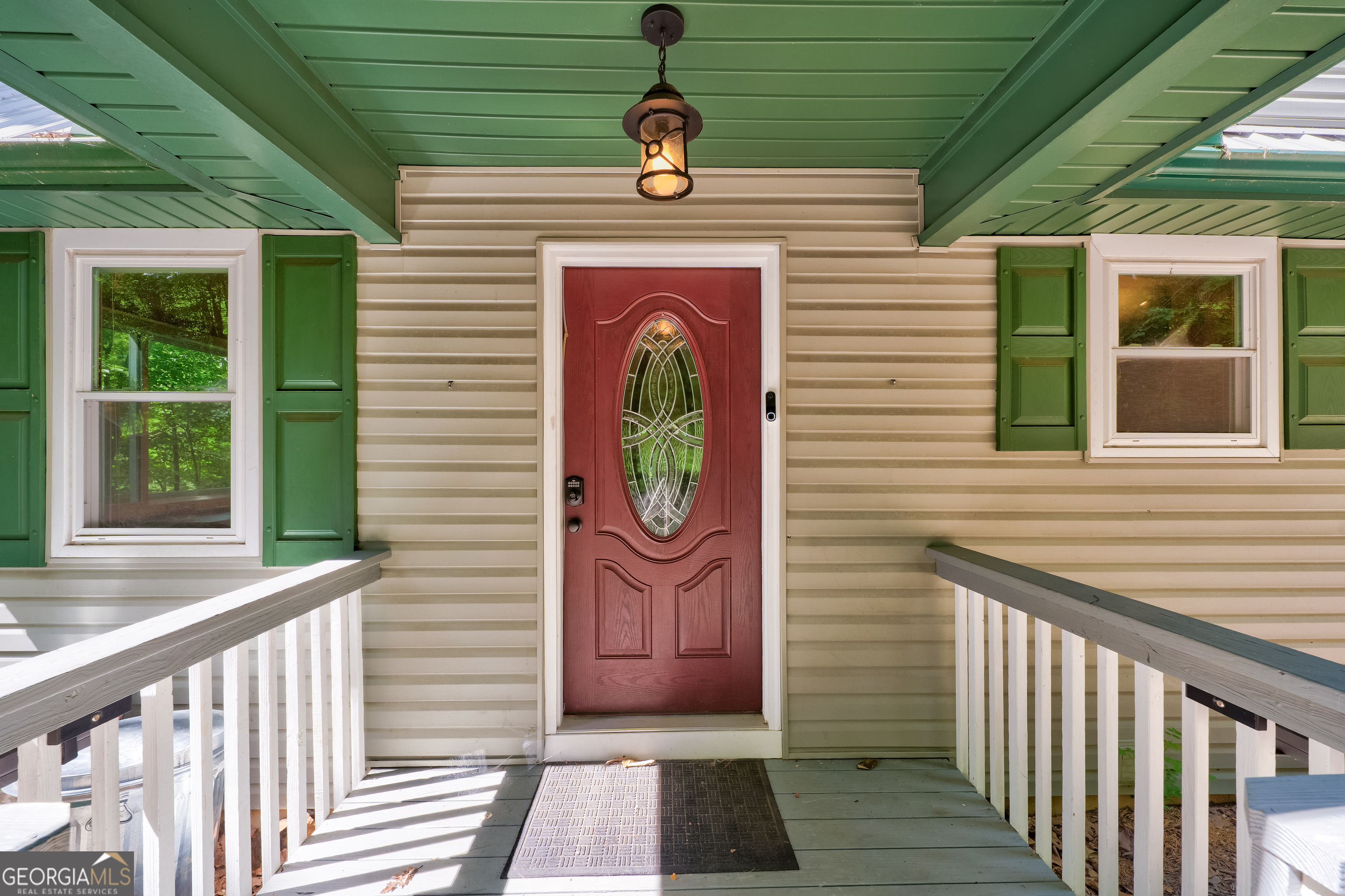 708 Wilson Mountain Road Blairsville, GA 30512 - Photo 8 of 48 a front view of a house with garden