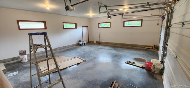 a view of balcony with deck and backyard