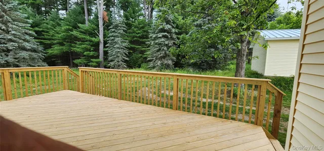 a house that has a big yard in front of it