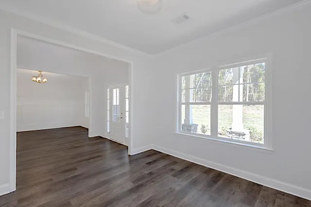a bathroom with a granite countertop sink and mirror