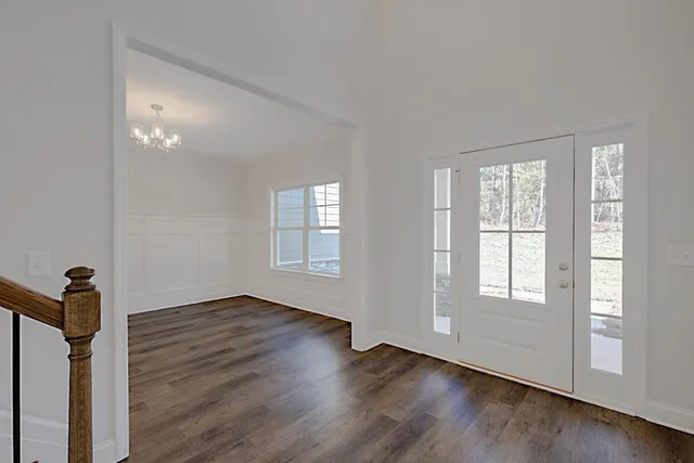a view of an empty room with a fireplace