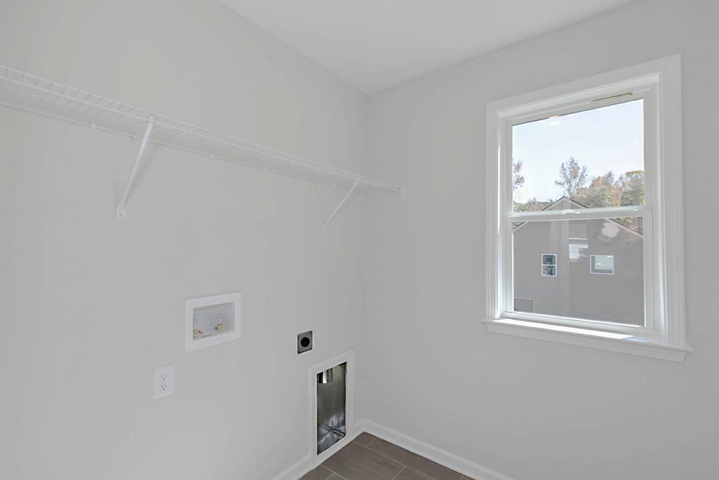 8705 McKee Road Upatoi, GA 31829 - Photo 28 of 42 a view of empty room with window
