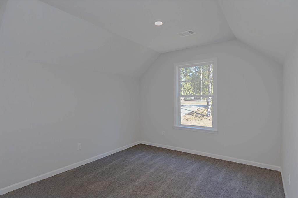 8705 McKee Road Upatoi, GA 31829 - Photo 33 of 42 an empty room with a window