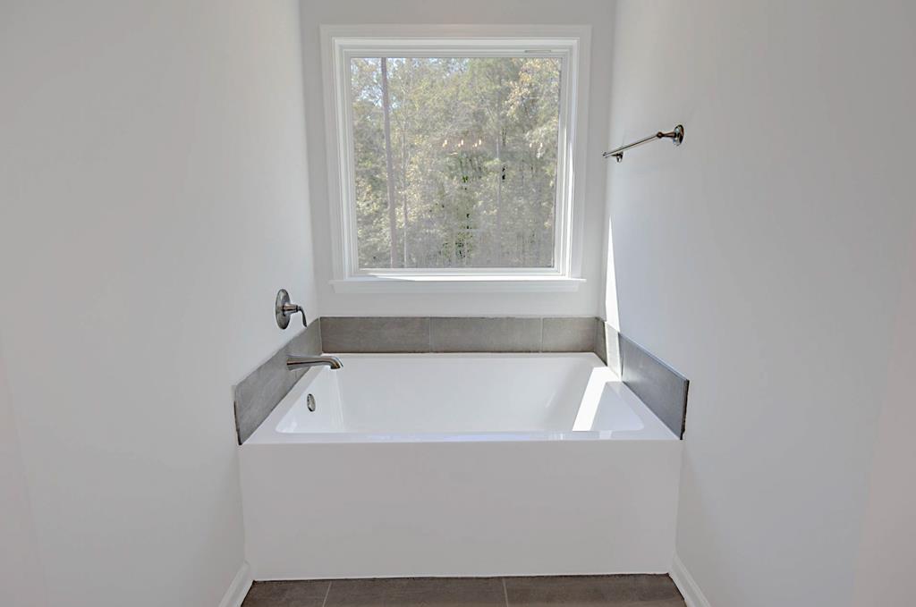 8705 McKee Road Upatoi, GA 31829 - Photo 36 of 42 a bathroom with a bathtub